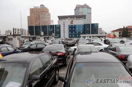 滬私車過戶新規(guī)出臺 二手市場有點淡 競拍標書或熱銷